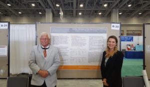 Baileigh Kirkpatrick presenting a poster with Steve McCallum at the 2017 APA Convention