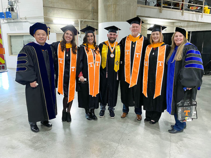 Group photograph of Ed Psych Online Graduates wearing their cap and gowns, Fall 2021